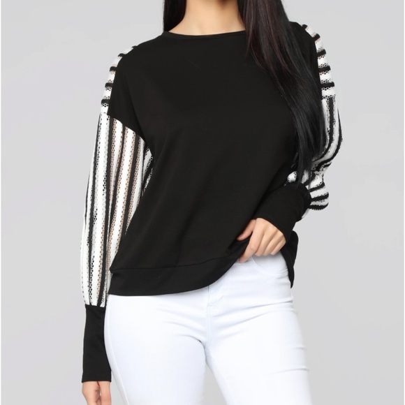 Fashion Nova Tops - NWT- FASHIONABLE BLACK AND WHITE SWEATSHIRT.